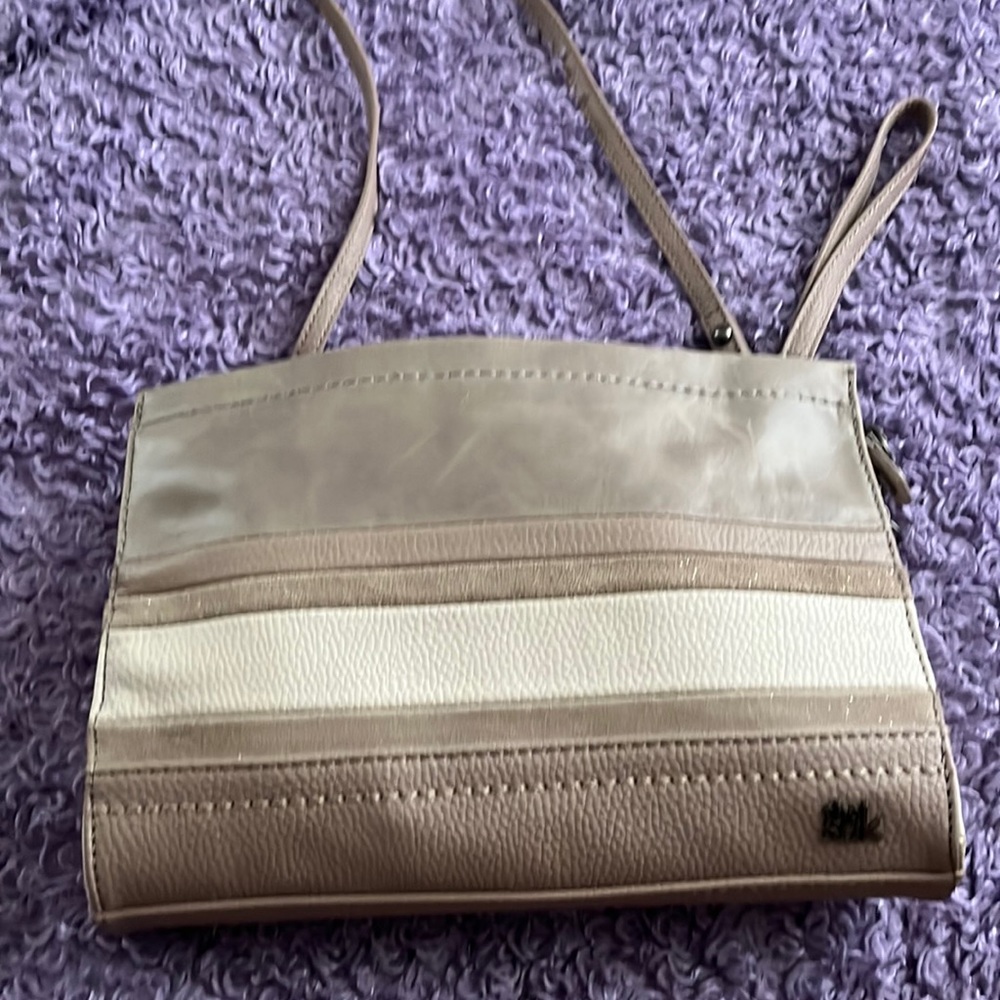 The Sak leather crossbody taupe with some glitter accents